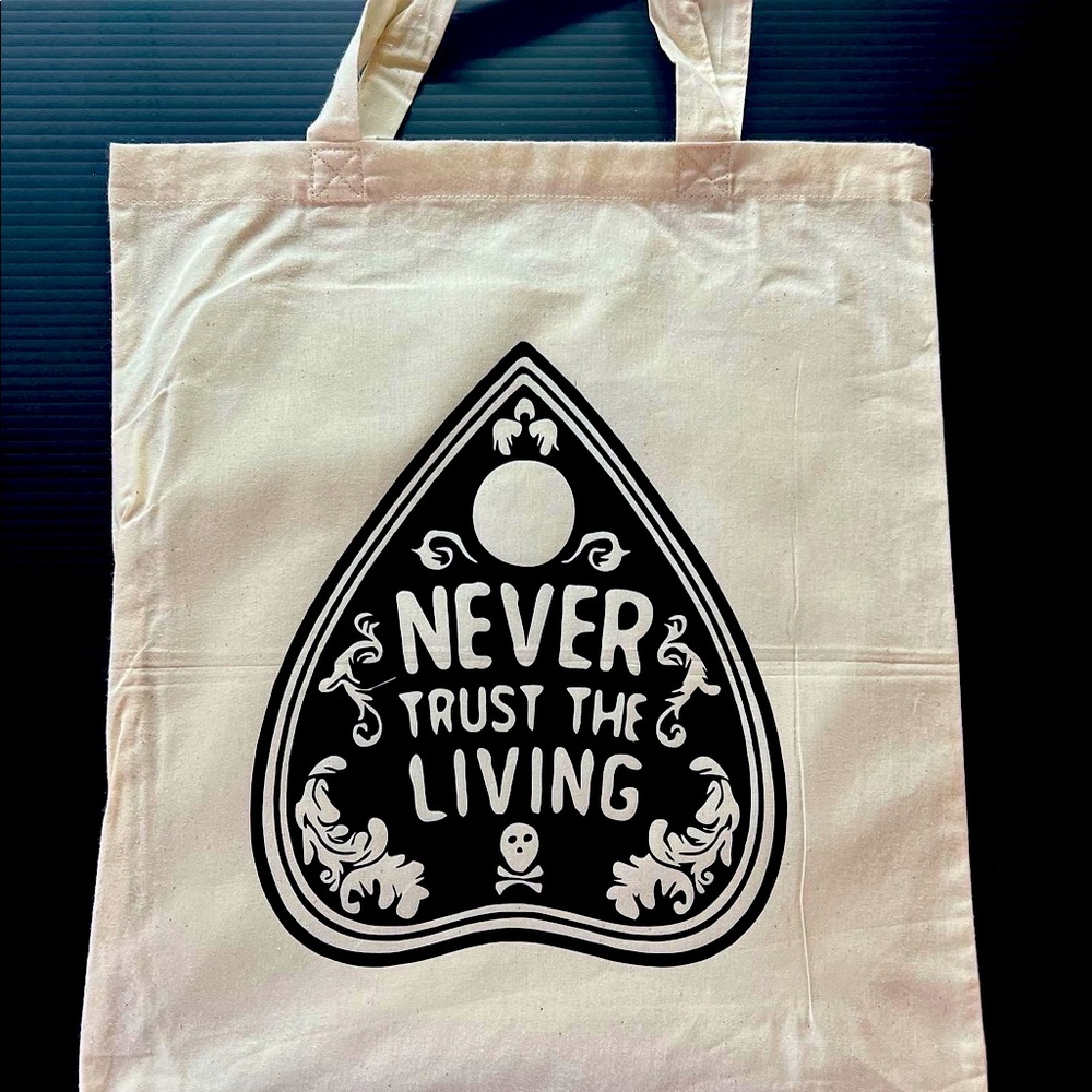 Canvas tote bag “Never trust the living” ouija planchette. 15”x14” Spooky.